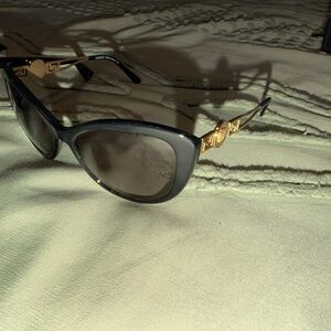 Elegant Black and Gold Sunglasses